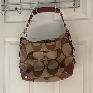 Coach Carly Hobo Bag in Signature Canvas with Hardware Accents